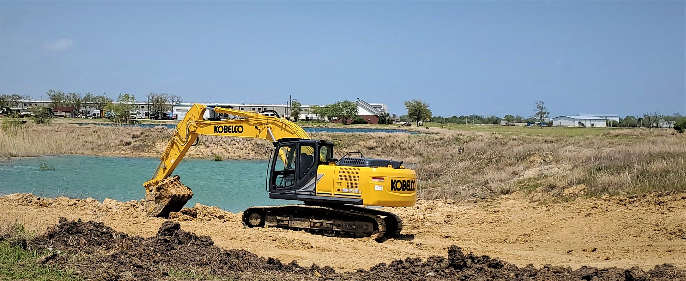 Conventional Excavator | SK210LC-11 | KOBELCO USA
